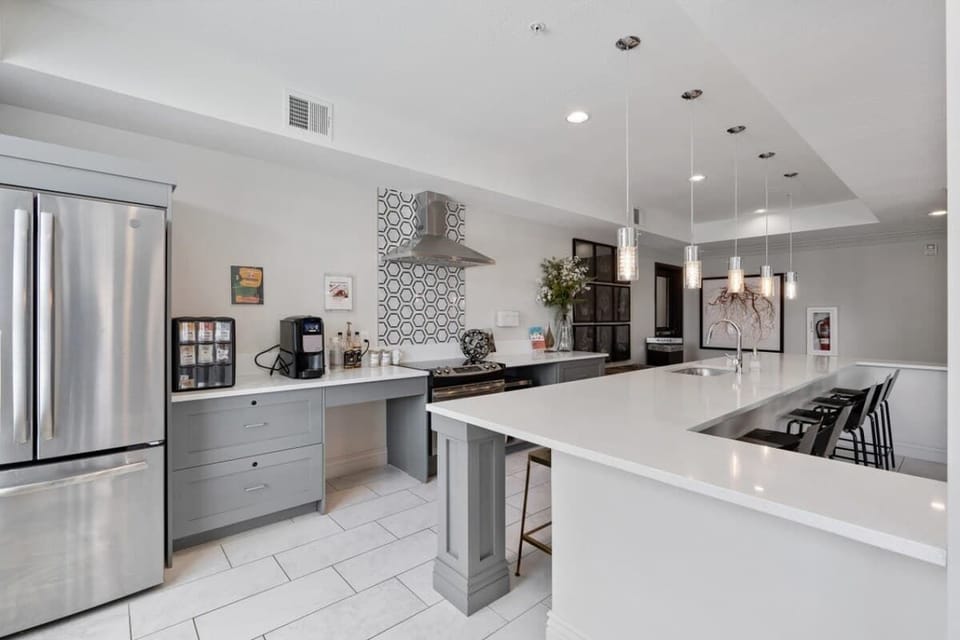 Start your day in our bright kitchen, complete with a coffee maker and a view through the large windows.