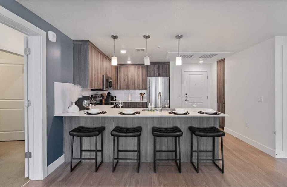 Wake up to fresh coffee in our kitchen,  stocked with utensils, a dishwasher, and an oven for all your culinary needs.