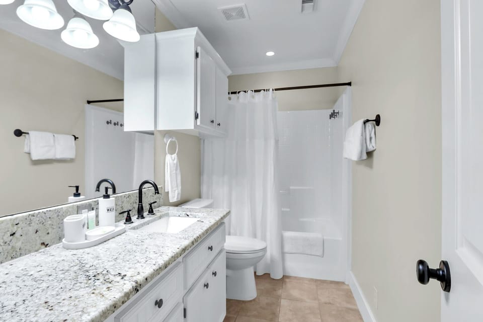 Bathroom two has a shower/tub combo