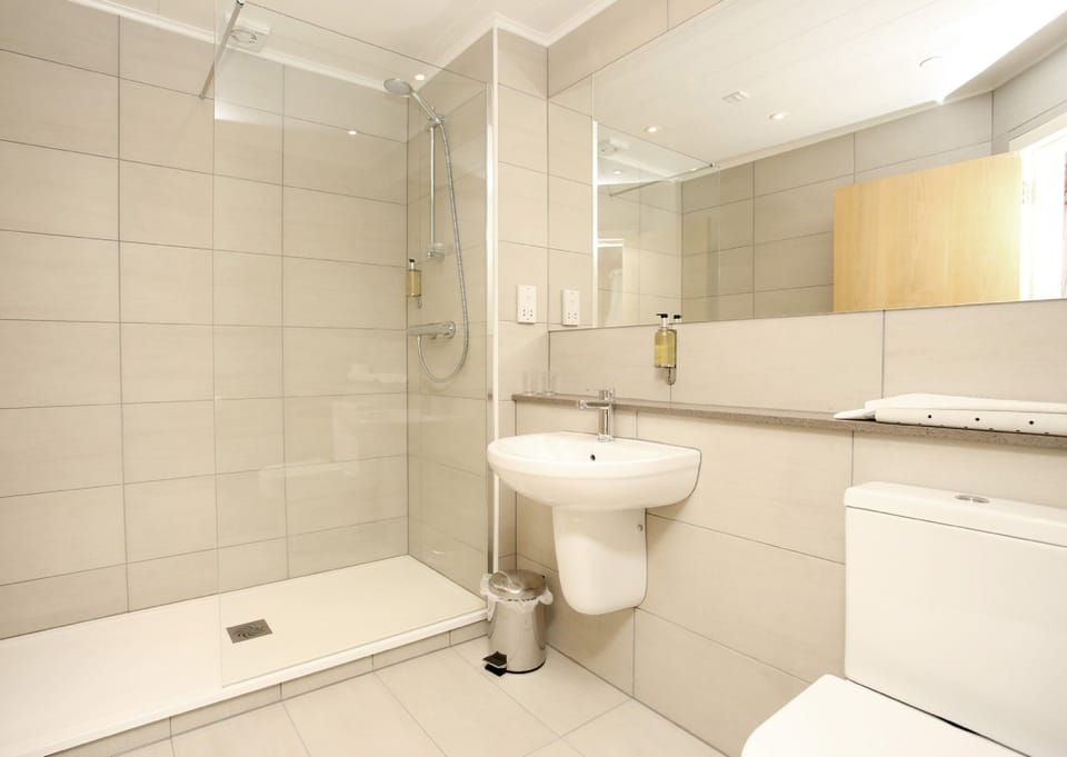 Shower, free toiletries, hair dryer, towels