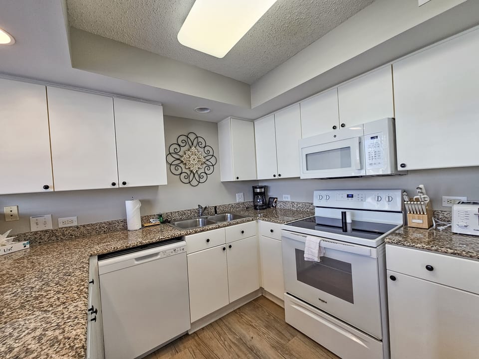 Condo, 2 Bedrooms | Private kitchen | Coffee/tea maker, fridge, oven, toaster