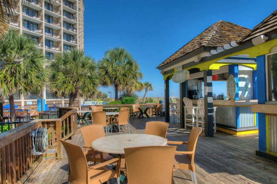 Enjoy your favorite beverage at the tiki bar.
