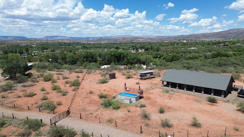Aerial shot of our entire property, home on the right and airstream on the left