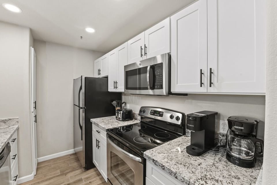 Fully stocked kitchen with everything you need, bar seating and plenty of room.