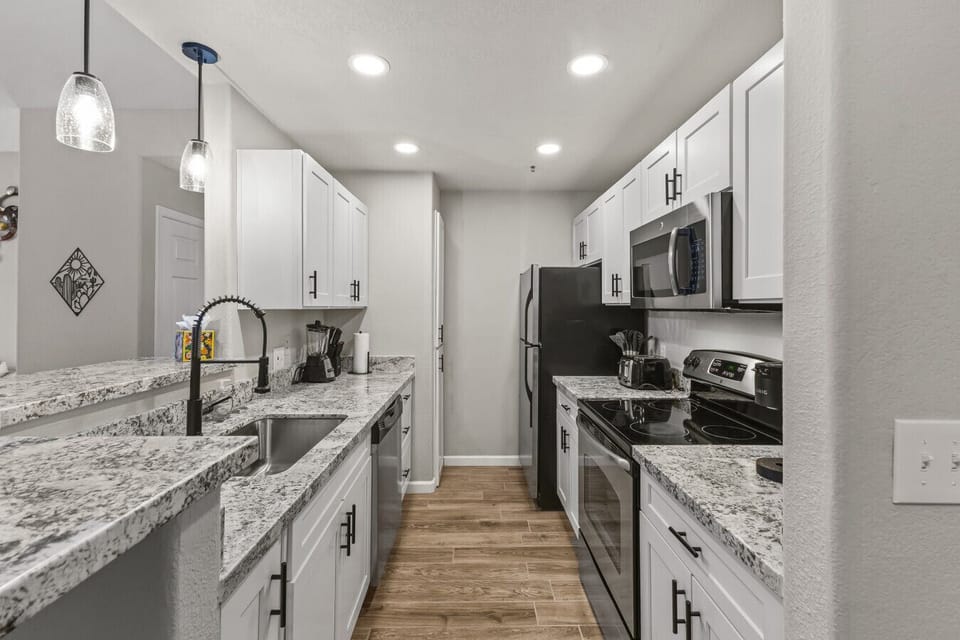 Fully stocked kitchen with everything you need, bar seating and plenty of room.