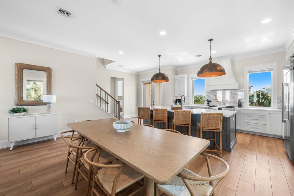 Gather around your spacious dining table while the chef in your group creates masterpieces in the gorgeous open kitchen.