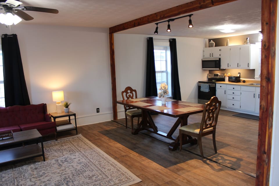 Open kitchen, dining, and living