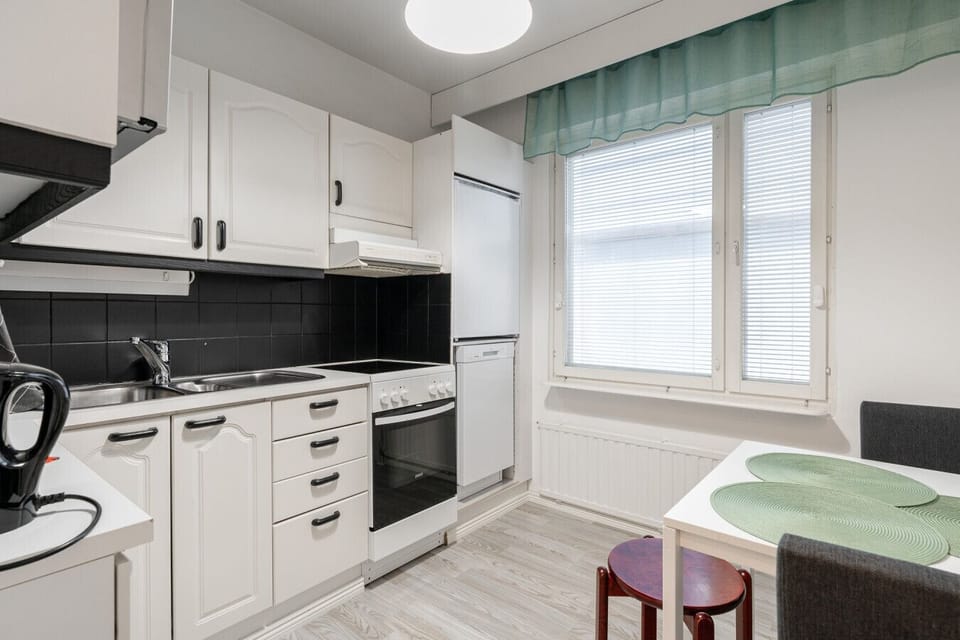 Gather around this cozy dining table, perfect for shared meals, casual work sessions, or late-night card games.