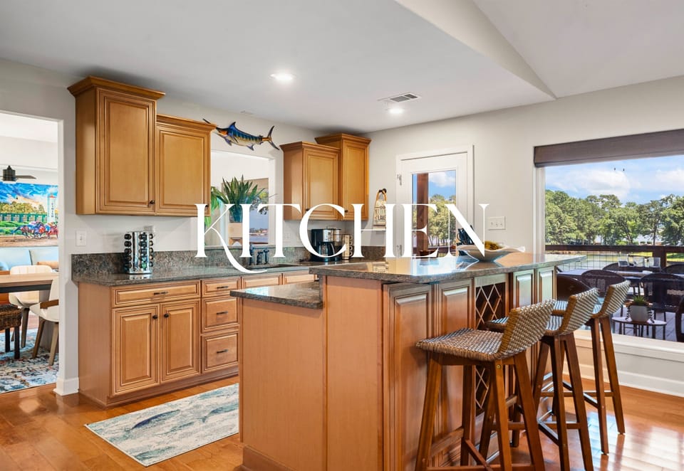 Fully stocked and stunning, the kitchen makes cooking a breeze—whether you're whipping up snacks or family feasts.