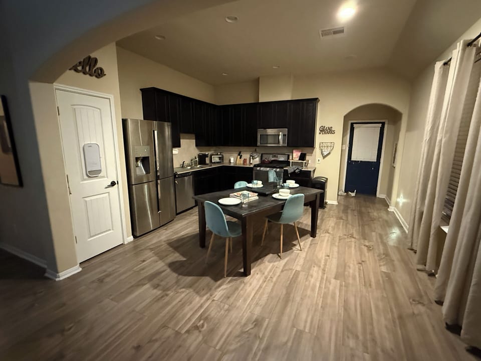 Fully equipped kitchen with modern appliances.