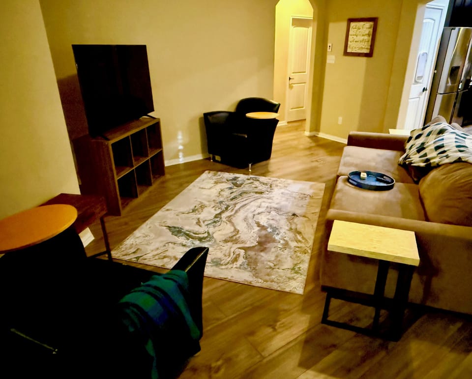 Cozy seating with Smart TV for streaming your favorite shows.
