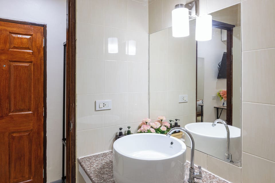 Standard Double Room | Bathroom | Shower, hair dryer, towels, soap