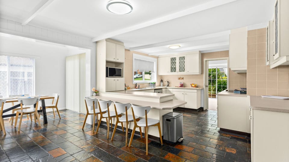 Kitchen, breakfast bar and dining table