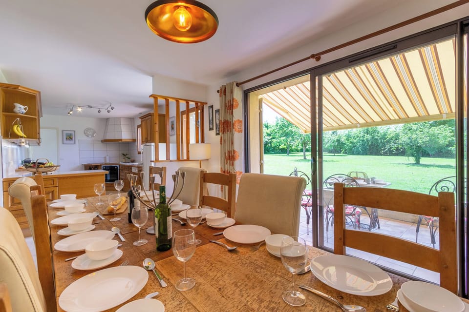 Dining table. open plan kitchen.
