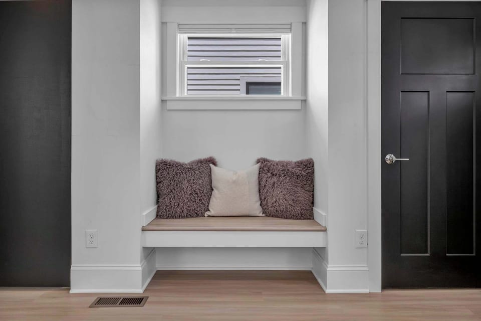 Your Peaceful Corner Awaits. Settle into this chic, comfy alcove with soft textures and modern charm, creating a serene space for daydreaming or unwinding after a busy day.