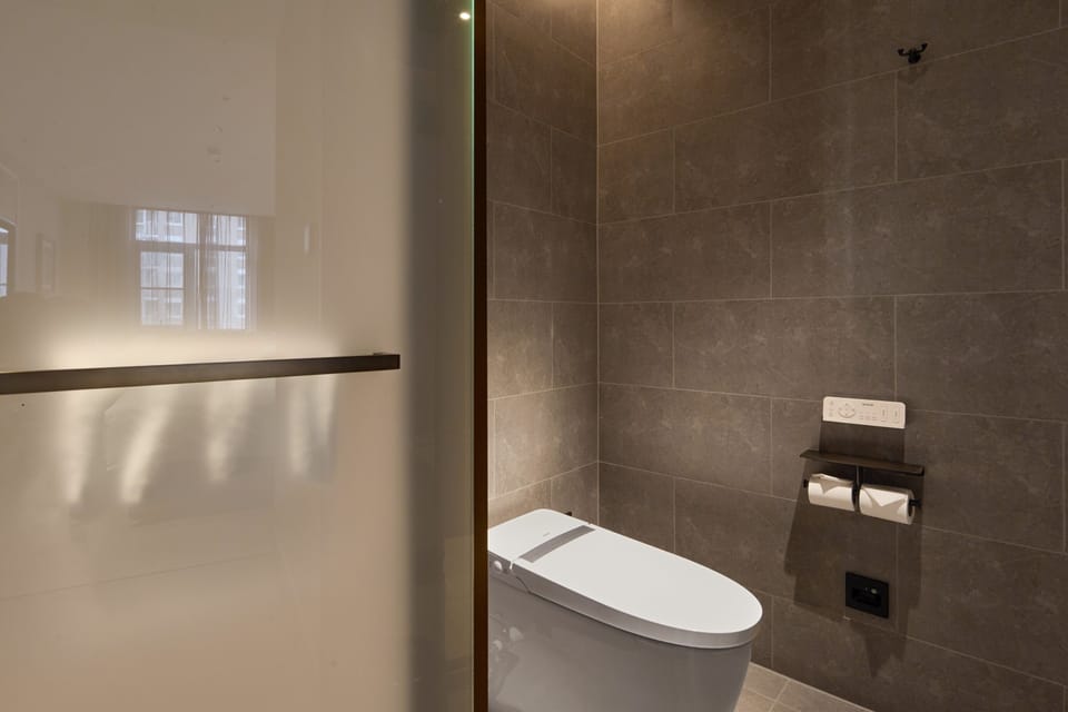 Shower, hydromassage showerhead, designer toiletries, hair dryer
