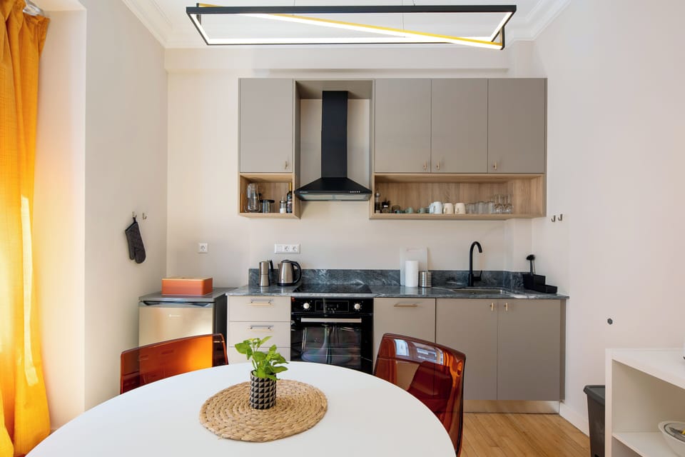 Apartment, 2 Bedrooms, Balcony, City View | Private kitchen | Full-size fridge, oven, stovetop, dishwasher