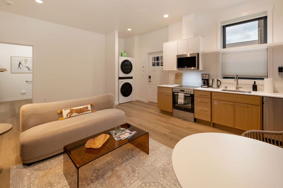 Spacious living and kitchen area with ample supplies