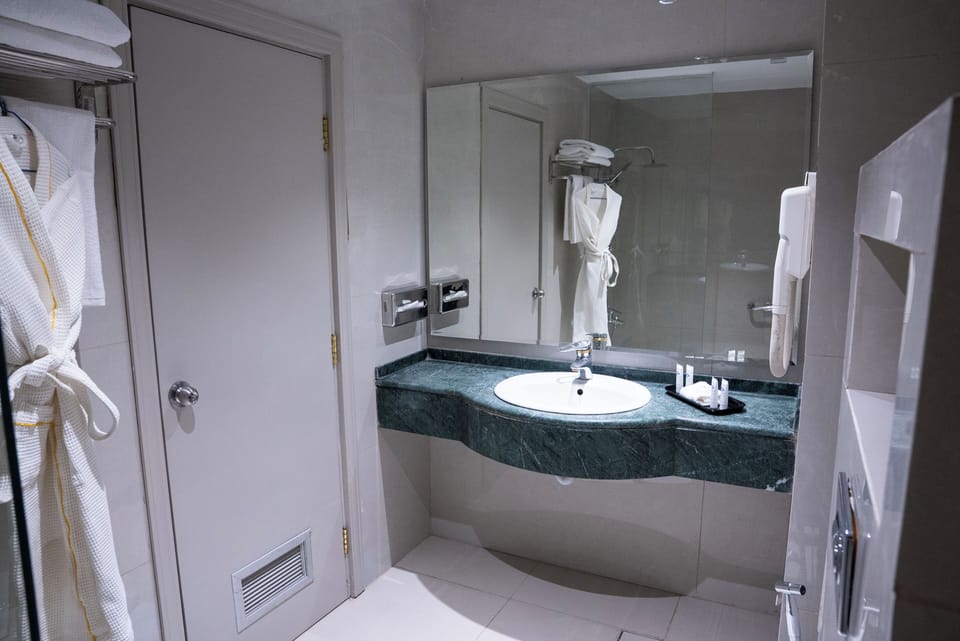 Shower, hair dryer, bathrobes, slippers