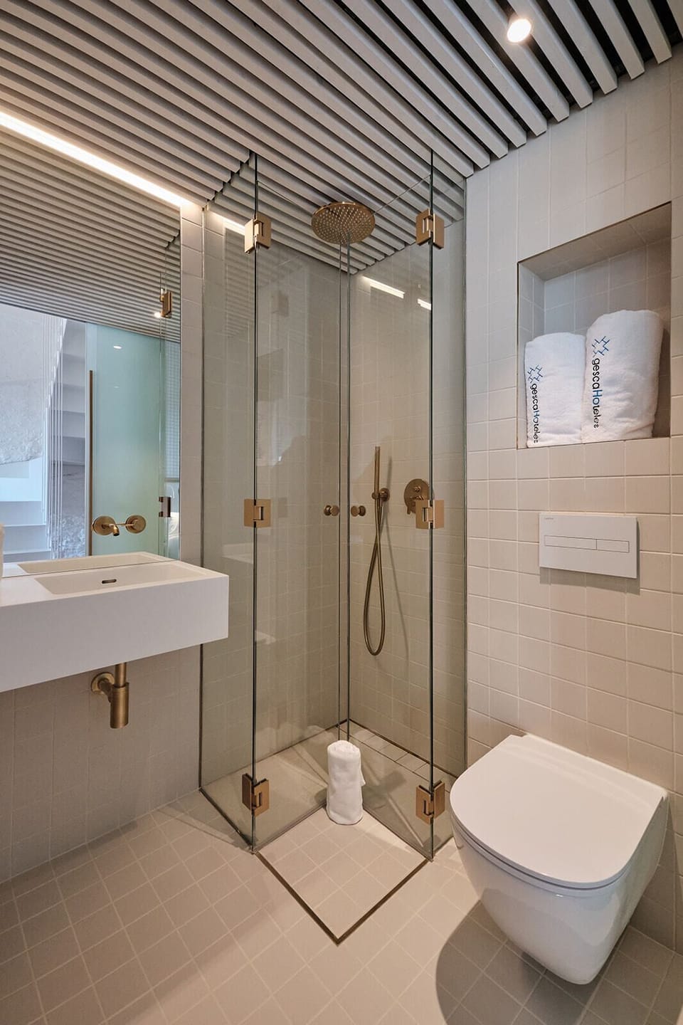 Shower, hair dryer, slippers, towels