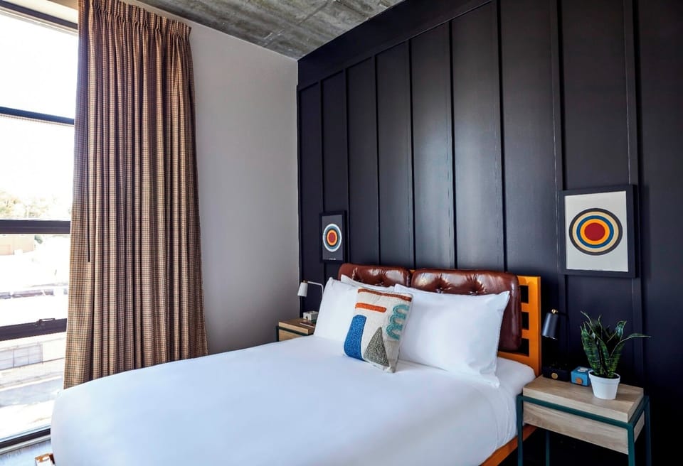 Drift off in a serene room with designer accents and calm.