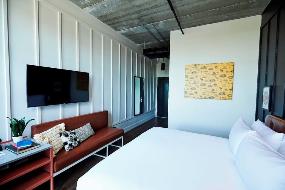 Stretch out in an airy room with crisp lines and art.