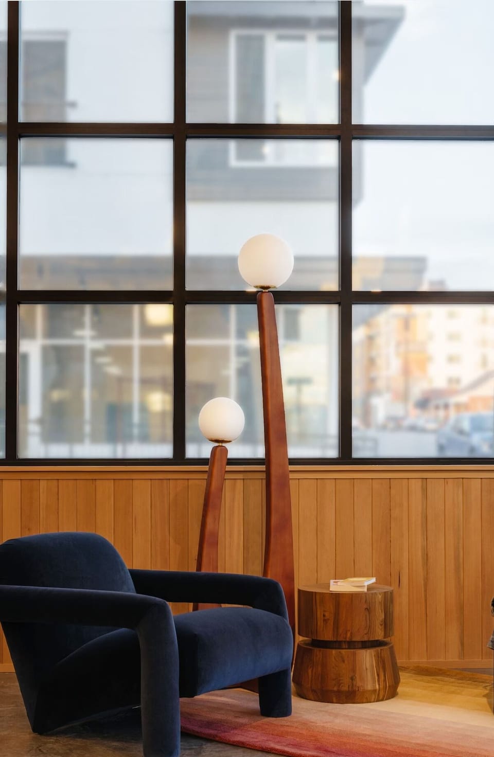Recharge quietly in a modern corner with soft ambient glow.