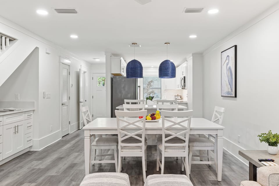 Your bright dining space flows into the modern kitchen, perfect for sharing memorable meals together.