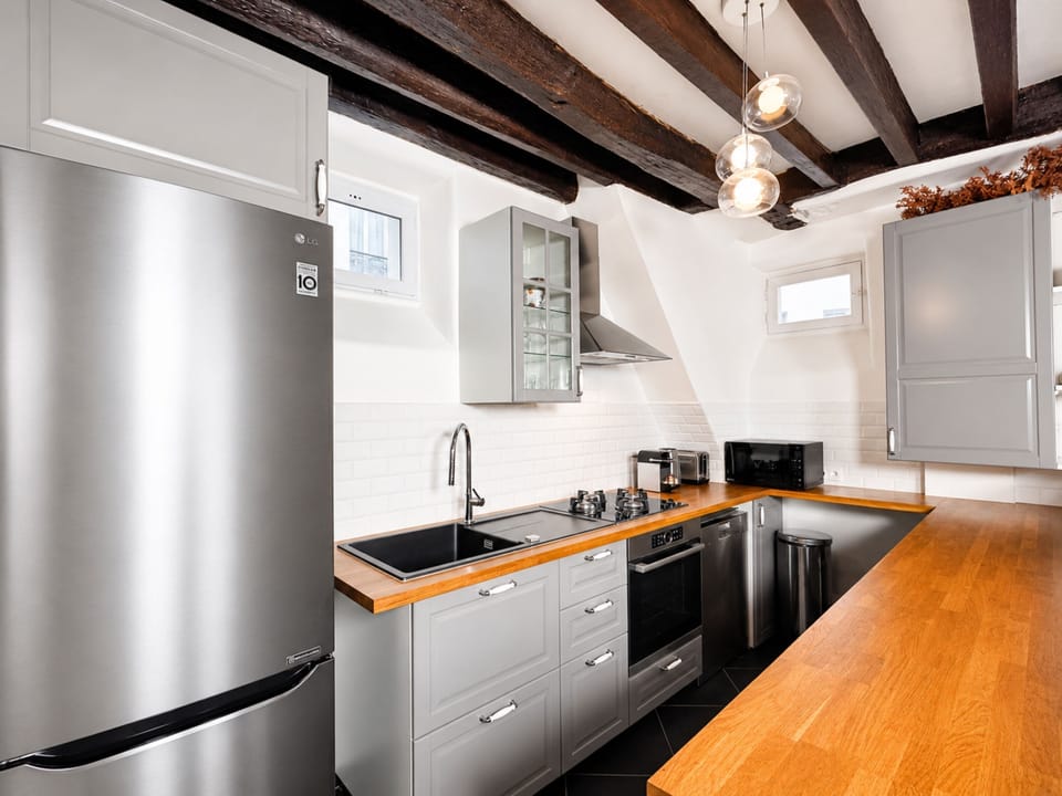 Signature Apartment, Courtyard View | Private kitchen | Espresso maker, electric kettle, toaster, freezer
