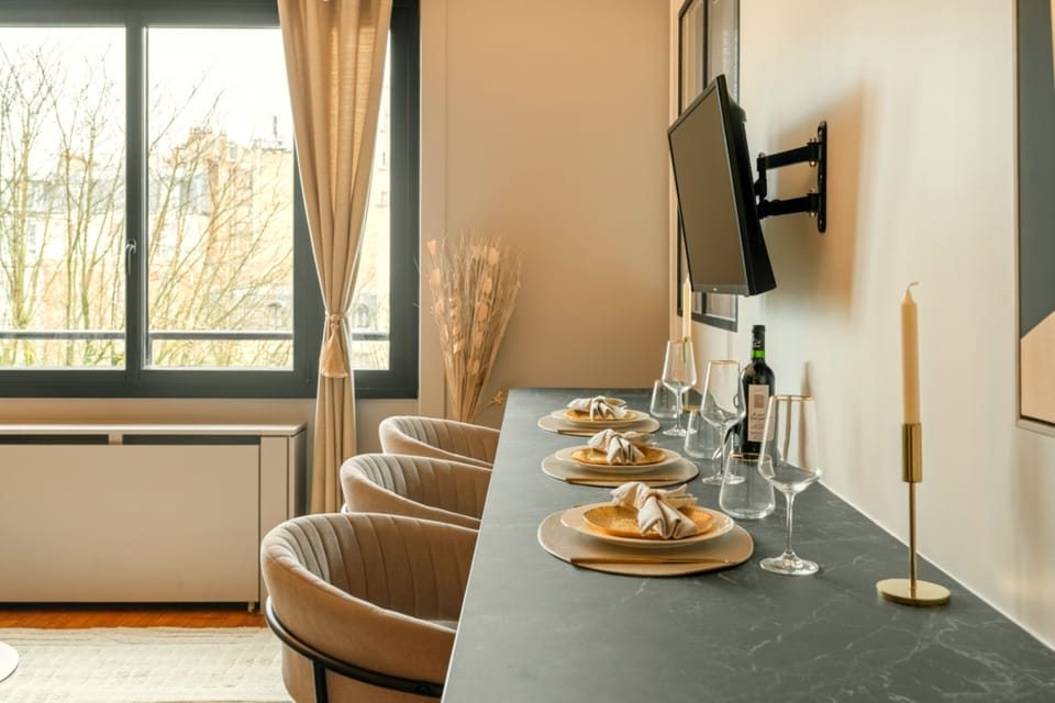 Superior Apartment, Garden View | Living area | 80-cm Smart TV with digital channels
