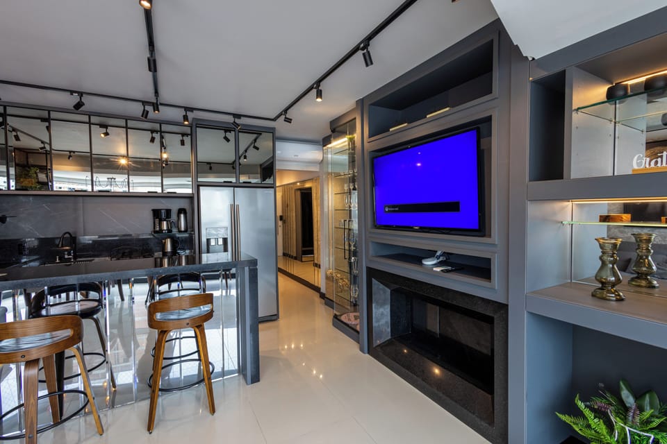 Comfort Apartment | Living area | TV