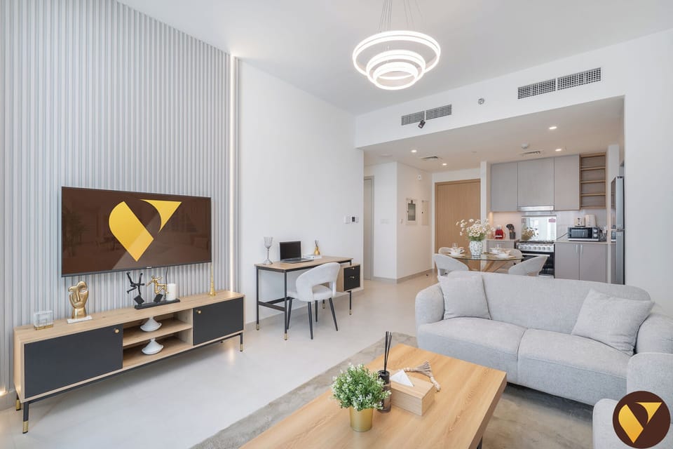 Luxury Apartment, Balcony, City View | Living area | 55-inch Smart TV with cable channels