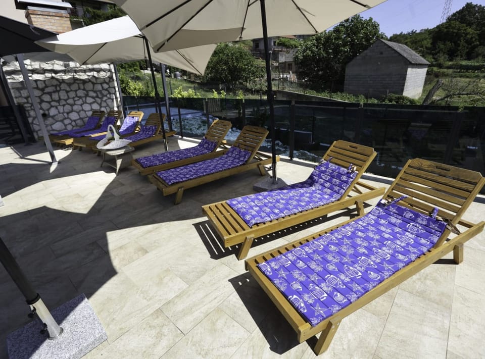 House (Five Bedroom Holiday Home) | Outdoor pool | Outdoor pool, pool umbrellas, sun loungers