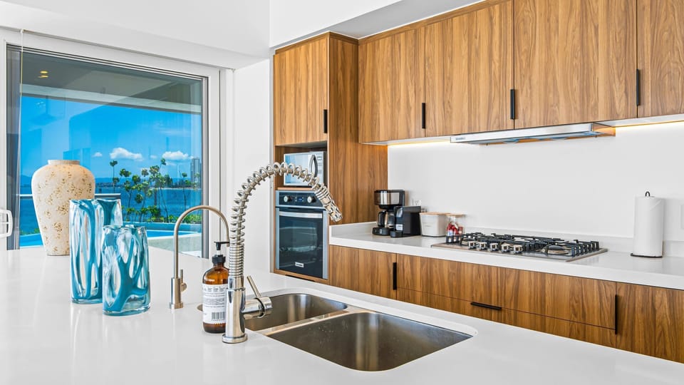 Deluxe Apartment, 3 Bedrooms, Beach View | Private kitchen | Coffee/tea maker, electric kettle