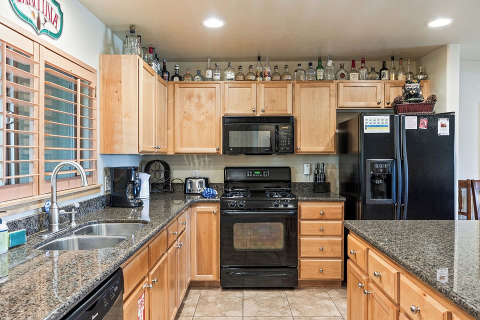 - Fully equipped kitchen with granite countertops  
- Modern appliances ready for home-cooked meals  
- Spacious design for group dining and entertaining