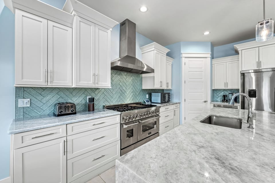 The kitchen with a commercial grade gas range.