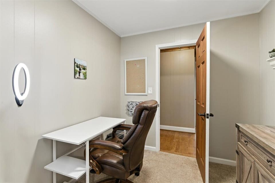 There is a shared office space located upstairs, perfect for work or study.