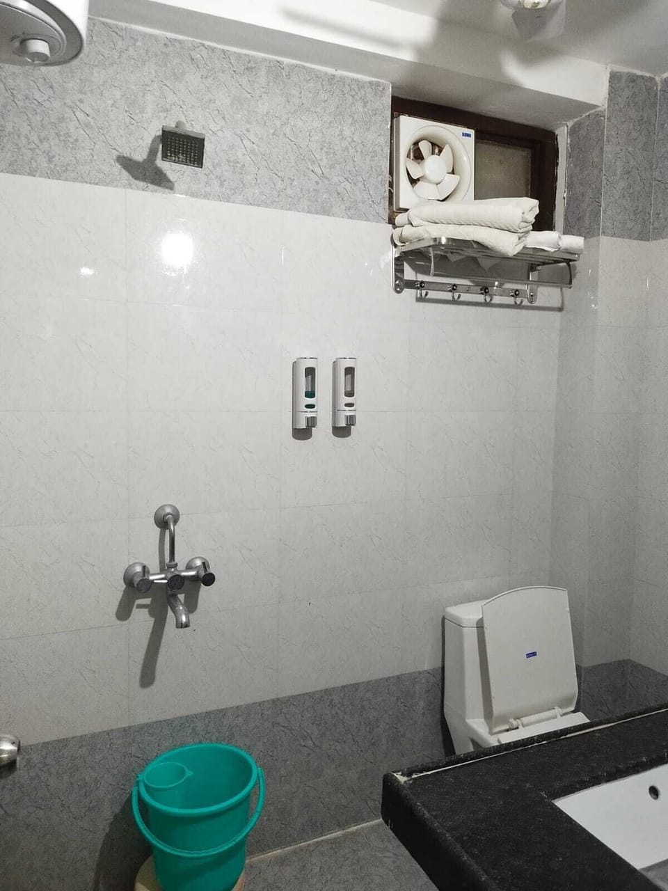 Shower, towels, soap, shampoo