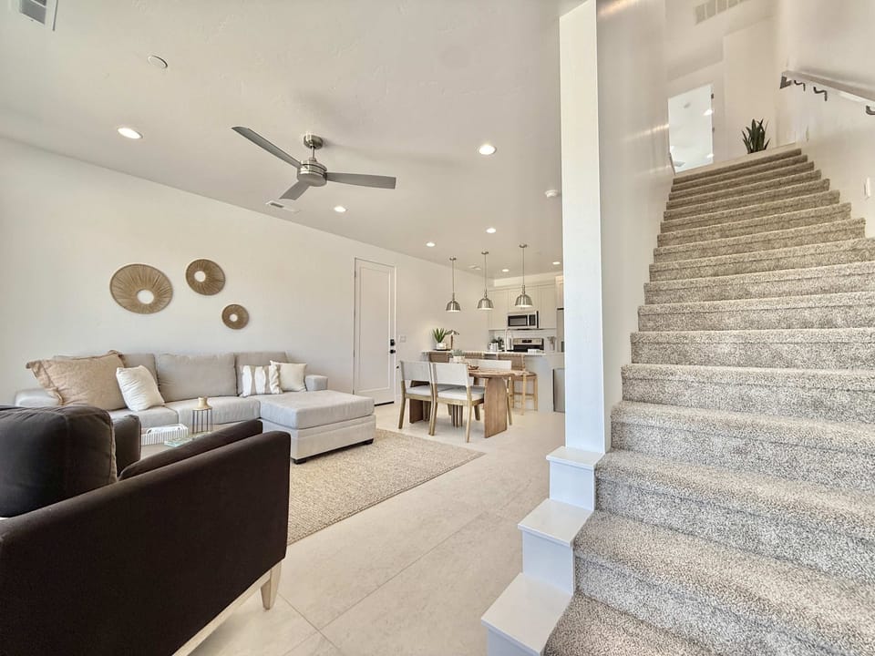 Head upstairs to find a second primary suite, bedroom 3, a laundry room and a 3rd full bathroom