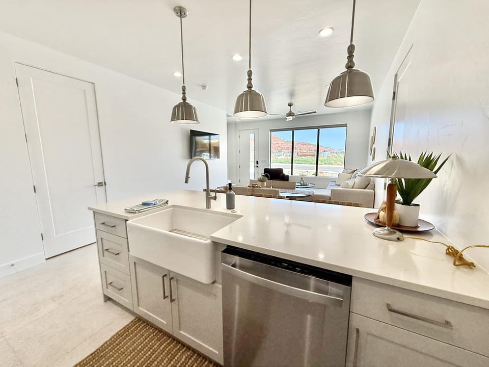 The open concept floor plan blends the kitch, dining area, and living room for your convenience. A half bath and primary suite are also lcoated on this level
