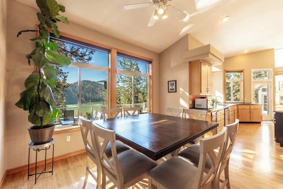 Large kitchen table that seats 8 plus additional bar stool seating 
