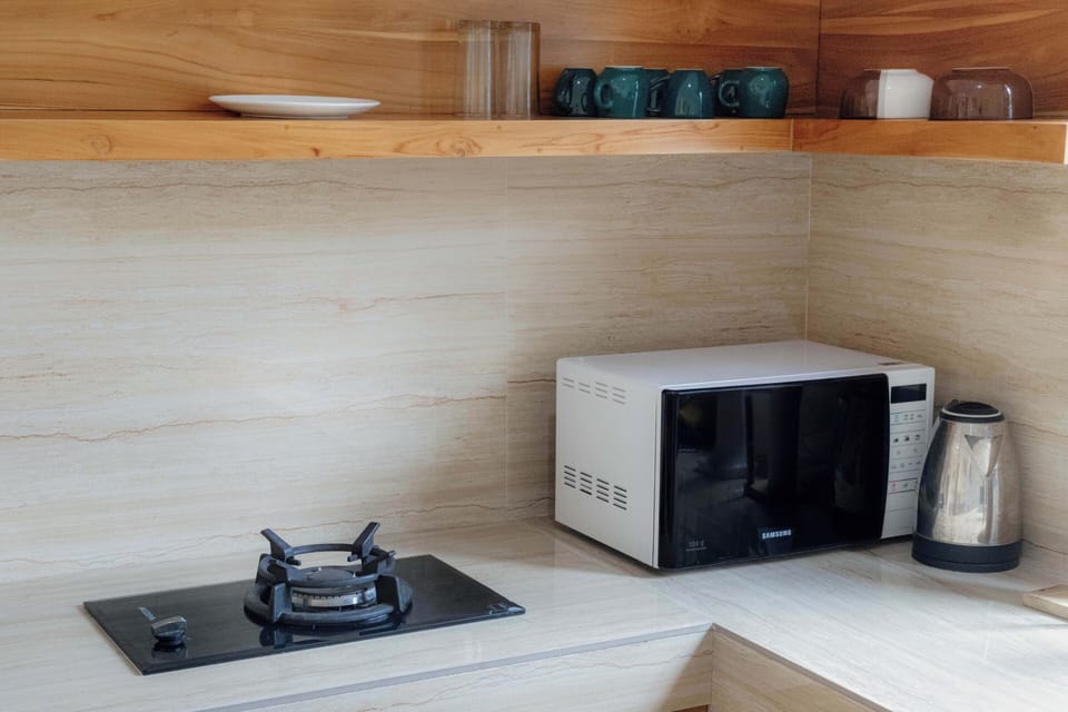 Deluxe Villa, Pool View | Private kitchen | Fridge, stovetop, cookware/dishes/utensils