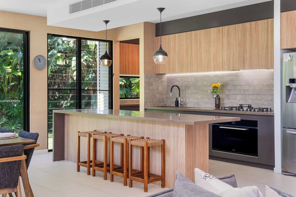 Start the day with a casual breakfast at the kitchen bar before heading to the beach.