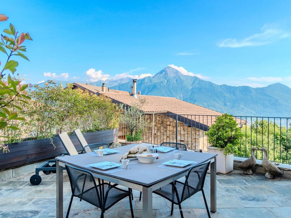 Furniture, Outdoor Furniture, Chair, Table, Mountain Range, Outdoor Table, Hill Station, Kitchen & Dining Room Table, Ridge, Alps