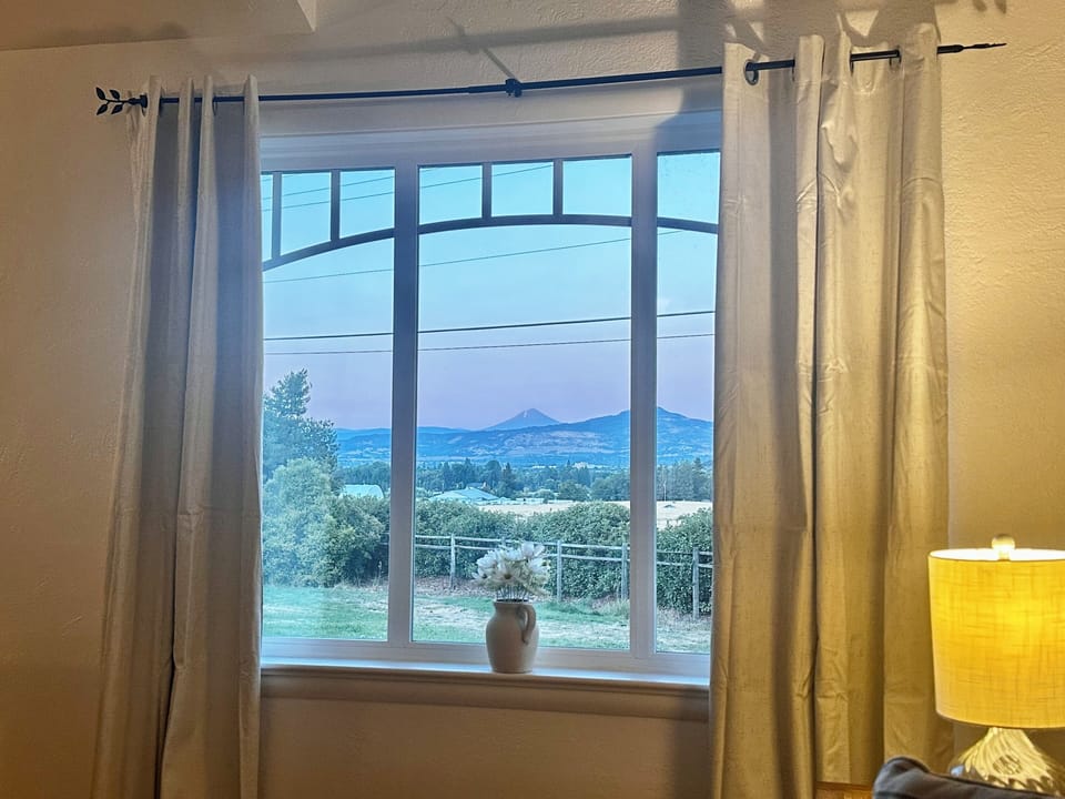 Sunrise from the Living Room with views of Mt. McLoughlin, RoxyAnn, and the Rogue Valley. 