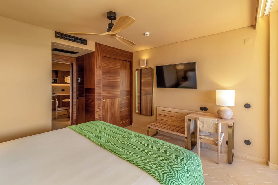 Free minibar, in-room safe, laptop workspace, blackout drapes