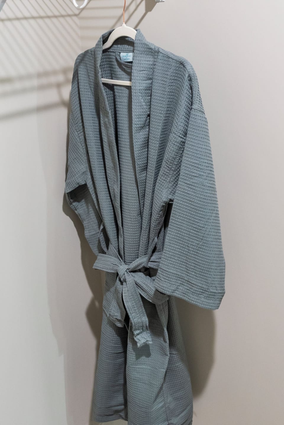 Cozy bathrobe provided for added comfort and relaxation.