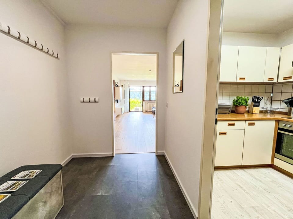 Flooring, Floor, Interior Design, Wood, Wood Flooring, Ceiling, Laminate Flooring, Room, Lighting, Door