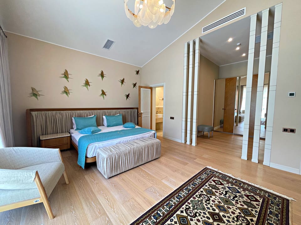 Four-Bedroom Villa | Minibar, in-room safe, iron/ironing board (on request), WiFi (free)