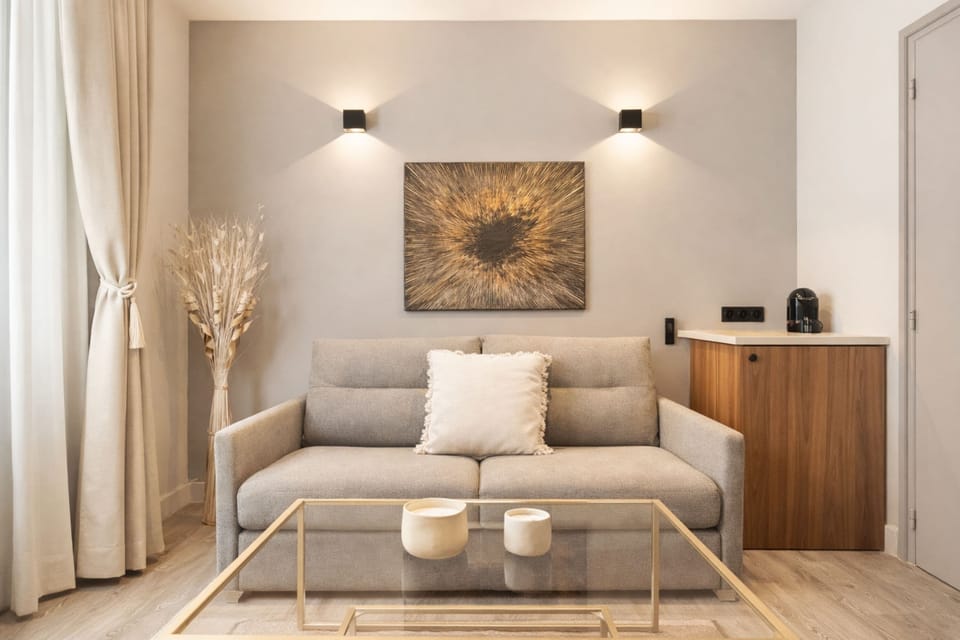 Standard Studio, Courtyard View | Living area | 80-cm Smart TV with digital channels